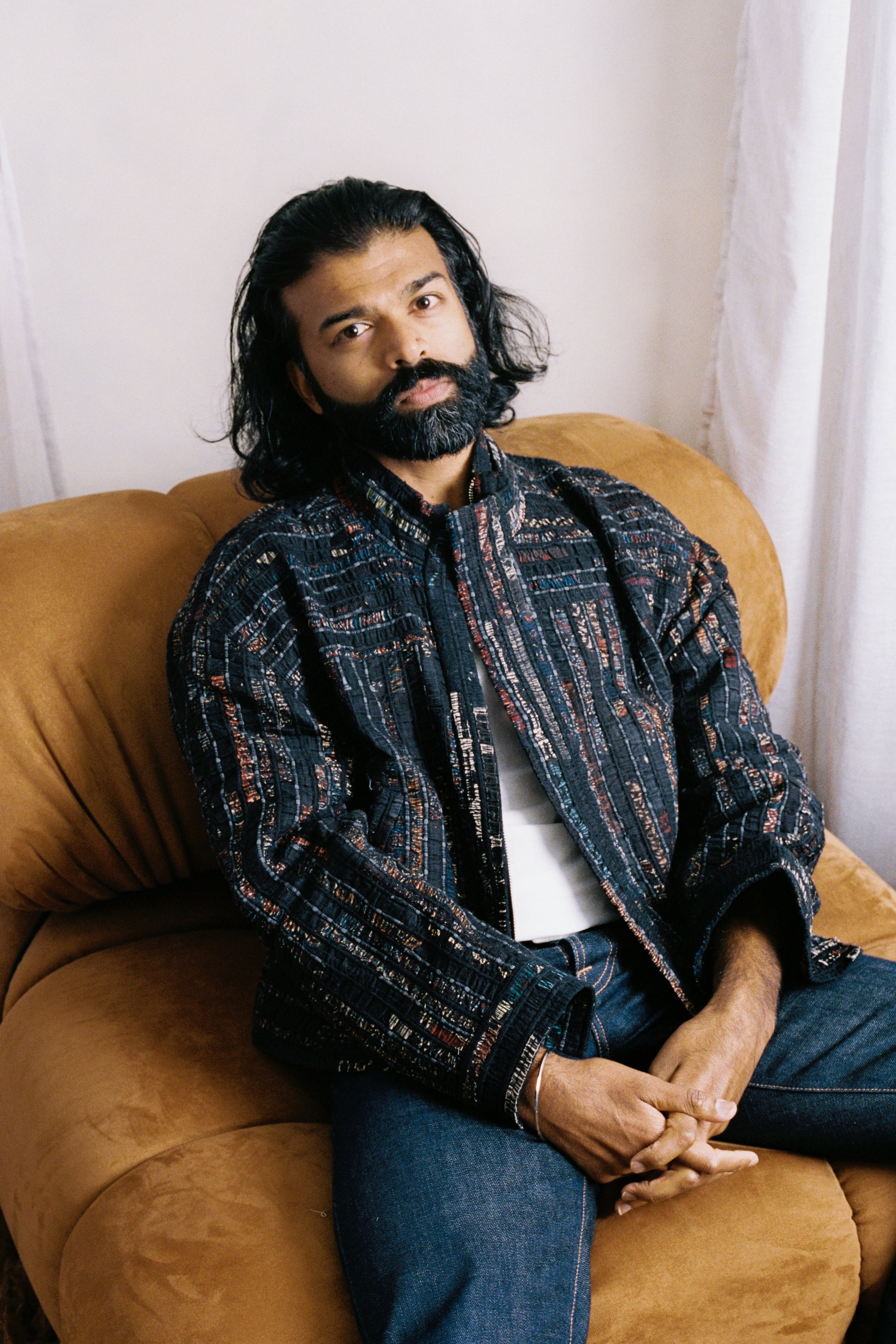 Qaim’s Sherry Bomber, worn by model, crafted from heavyweight upcycled fabric and lined for comfort. Designed in Melbourne, made in India.